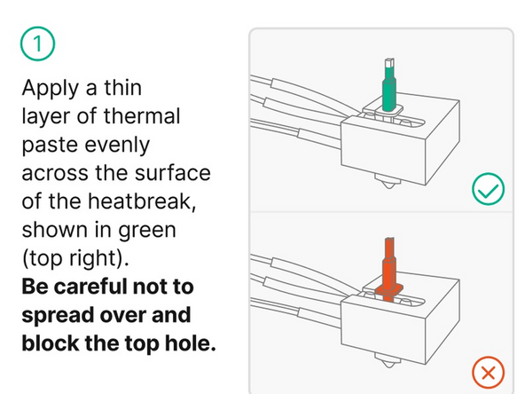 Apply thermal paste evenly to the heat break of the new Hot End. Take care not to spread paste over the top hole