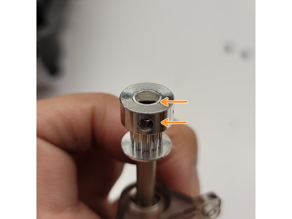 There is a small notch on top of the ingoing drive bracket, which should be facing towards the middle of the drive gear shaft. Similarly, the left ingoing drive bracket's notch should also face towards the middle of the drive gear shaft.