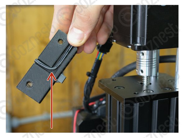 Tuck the wire underneath the Touch-Probe-Mount as seen in Image 1.