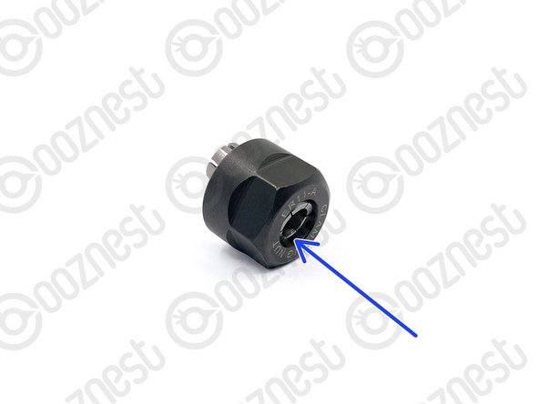 Apply downward pressure to the rim of the nut until it clicks into the retaining ring on the nut.