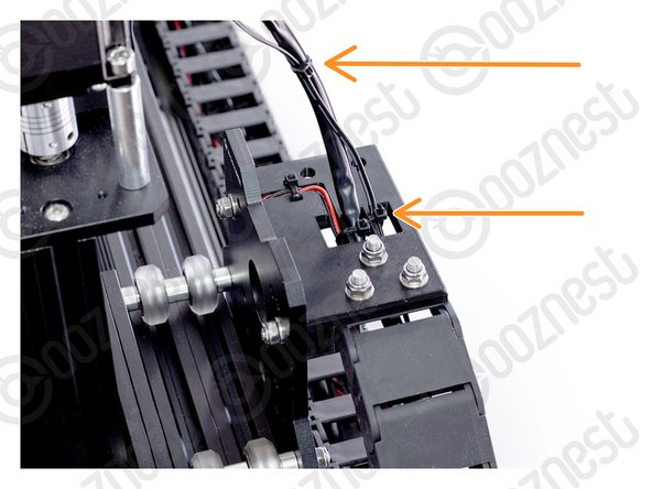 Secure the wire to the Drag-Chain-Mount using a small cable tie. Then secure it along Motor-Wire-6.
