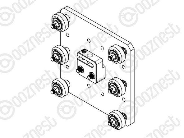 In the Z-Axis-Nut-Block bag there is a set screw. Screw it into the top of the Z-Axis-Nut-Block until it just touches the surface on the opposite side of the gap.