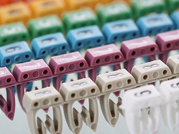 If the wires in your kit have white printed tags, please ignore this step. Each wire, at the connector end has a coloured clip with a number. This colour and number identifies this wire. Please see key below.