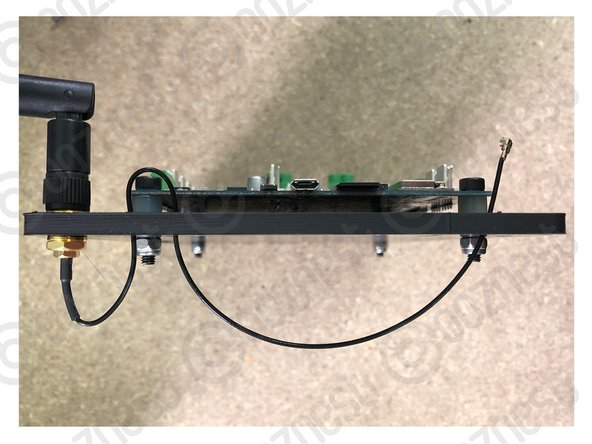 Unscrew the antenna wire from the antenna arm. There will then be 4 parts, antenna wire, star washer, spring washer, hex nut, antenna arm.