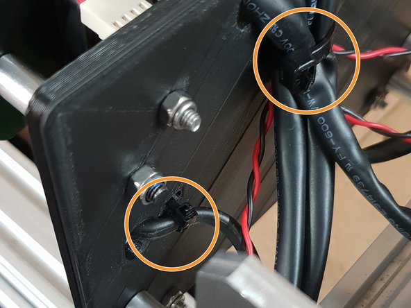 Using the already inserted cable ties fix the wires into place securely to prevent any unnecessary movement and to keep the machine looking neat!
