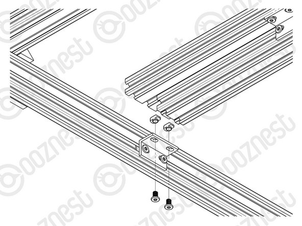 To complete the follow steps either prop the machine up on the end you are working on, or hang the side of the machine over the edge of a table.