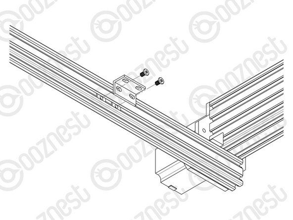 With a Universal-Bracket-Double in hand, notice that the holes down one side are not the same distance away from the corner edge as the holes on the other side. The side with the holes closest to the corner edge should go against the V-Slot-2040.