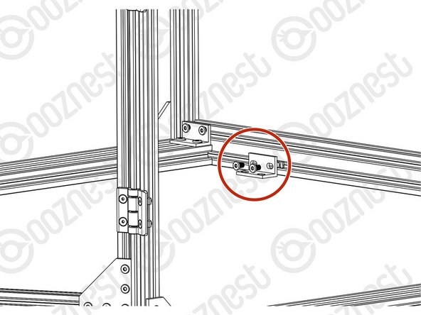 Using the Fix Down Universal-L-Bracket, fix them into Extrusion K front and back on the inside on the enclosure. These will allow you to secure the Enclosure to your work bench.