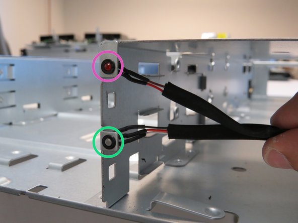 Push the front of the top (red) LED with your thumb.