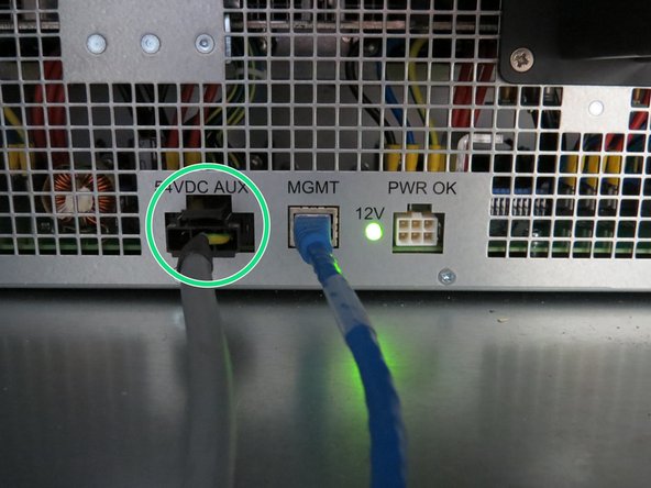 Disconnect the following rear cables to power down the power shelf: