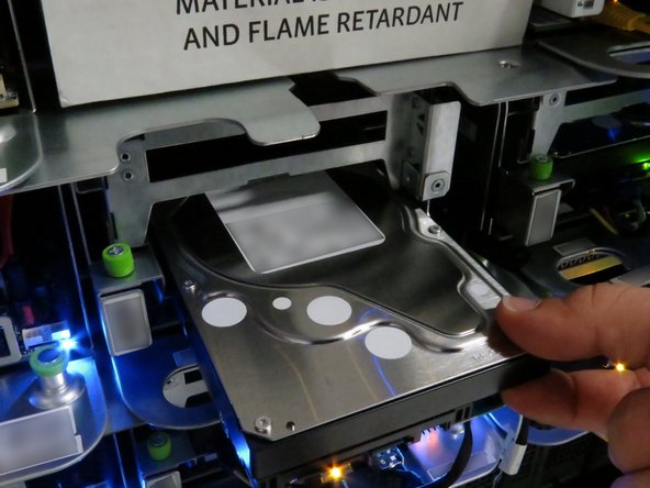 Slide the HDD forward (1) inch.