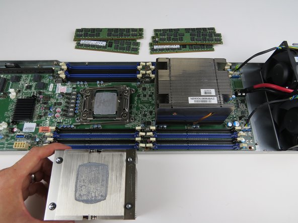 Remove (2) heatsinks and CPUs.