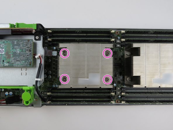 Loosen (4) torque screws with a Phillips #2 screwdriver.