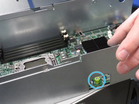 Engage the thumbscrew, as shown.