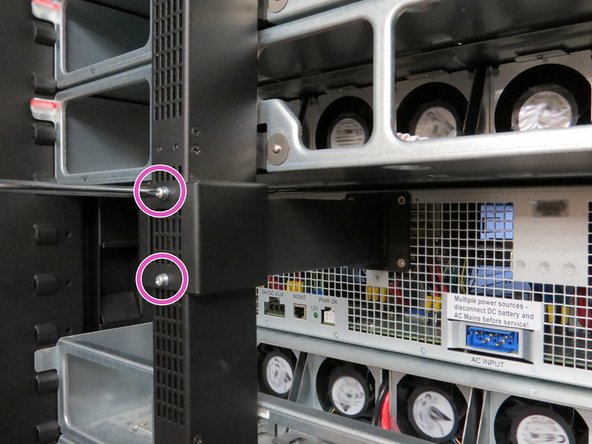 Prior to removing the output blade cover, ensure all PSUs and BBUs have been removed or unseated to eliminate potential risk of shock.