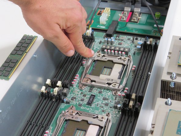 Close (2) CPU retention brackets.