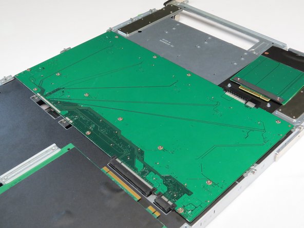 Install the thirteen Phillips #1 screws that were previously removed.