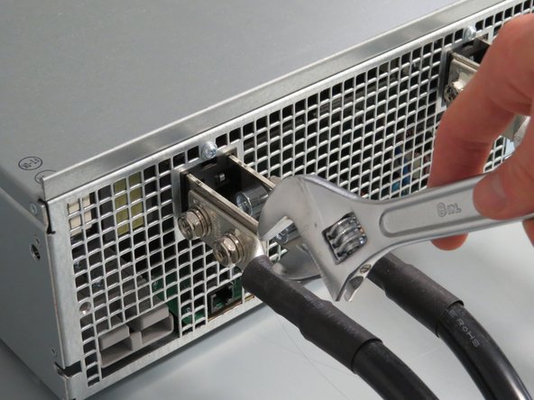 Make sure there is not live power on the bus bars before proceeding with this step.