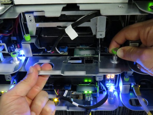 Pull the server away from the rack, as shown.