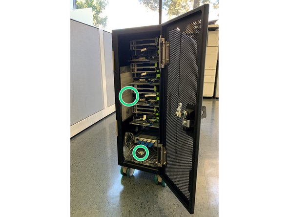 Remove 2 plastic bags containing power cables and quick start guide indicated by circles