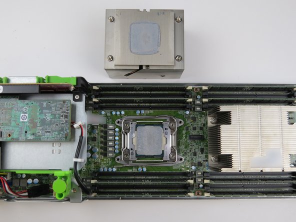 Enure the heatsink is facing downwards (with the thermal compound exposed).