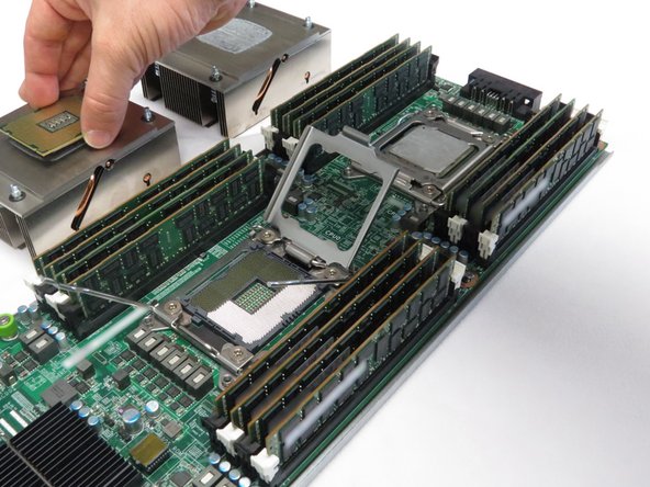 Ensure that the LGA socket contact pins do not make contact with any surface.