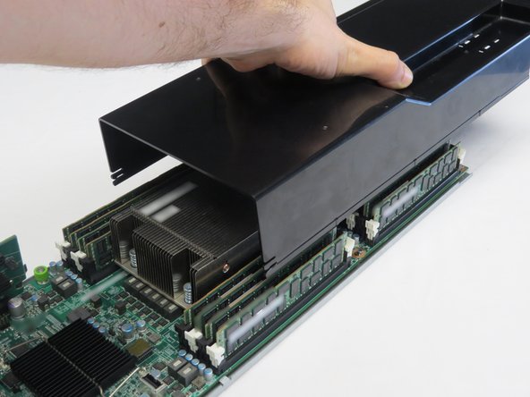 Install the lid onto the server node.