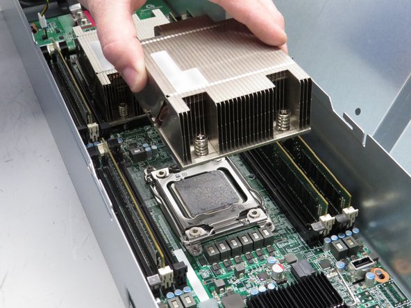 Lift the heatsink off the CPU.