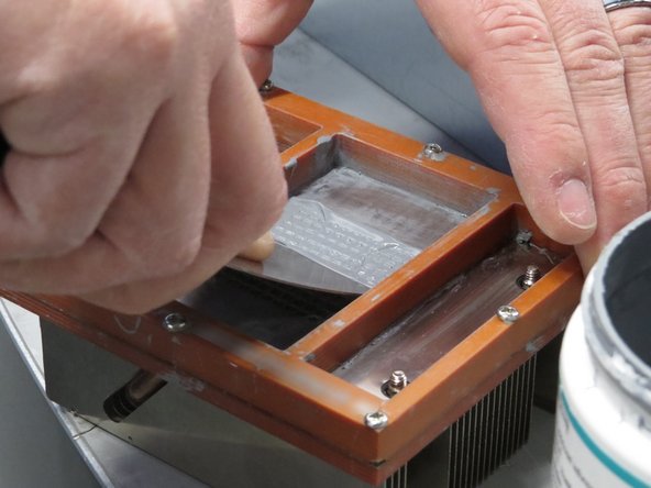 Apply thermal compound, as shown.