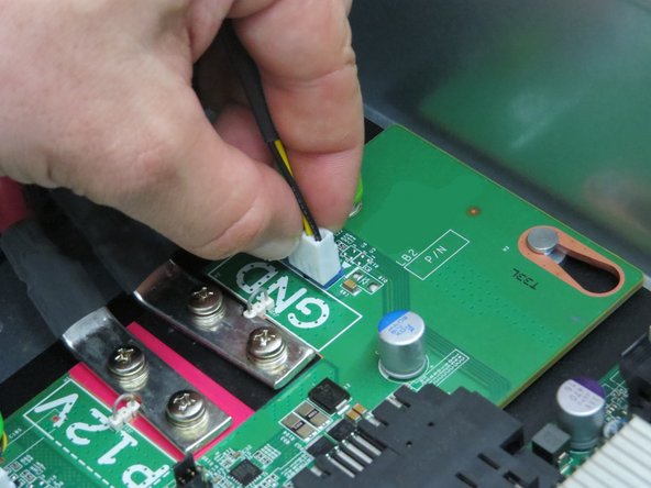 Pull the power connector from the motherboard.