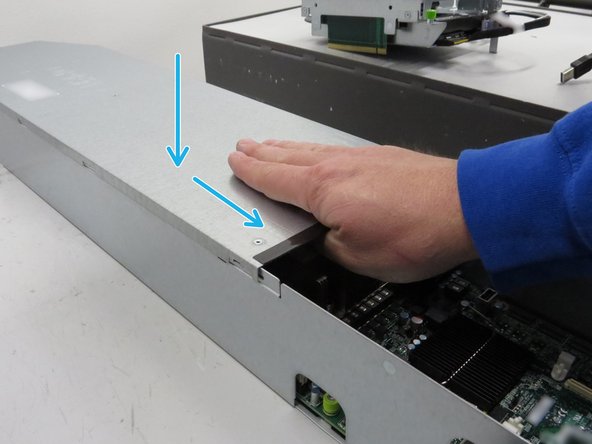 Install the lid on the server.