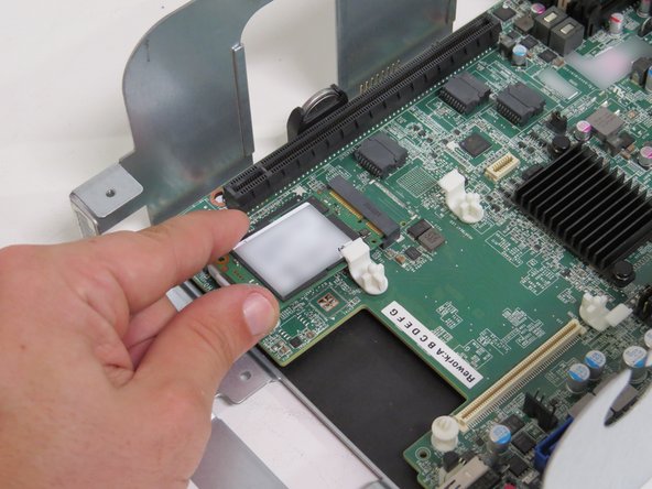 Connect the mSATA drive back into its socket.