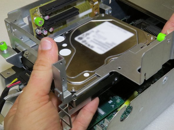 Install the riser cage.