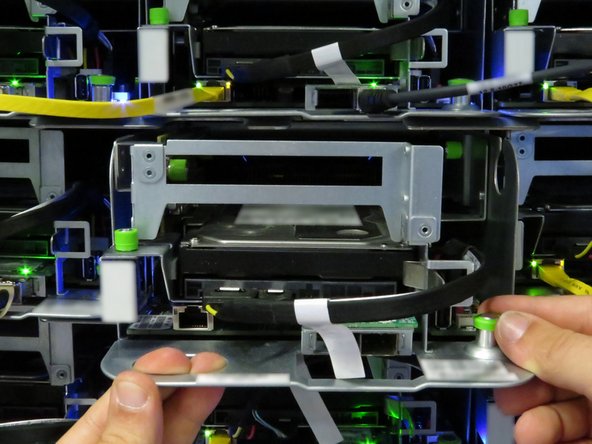 Begin sliding the server out of the rack.