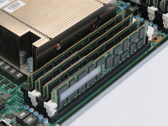 Press DIMM into socket.