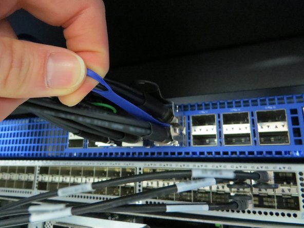Disconnect the QSFP cables and direct-attach copper (DAC) breakout cables.