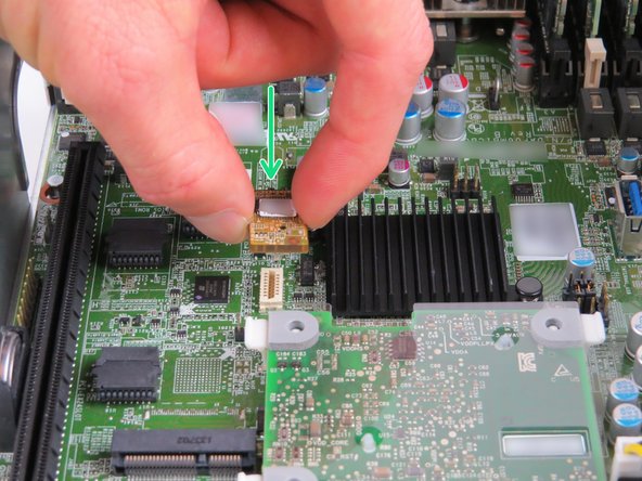 Once the TPM module connector has been aligned, insert it into the socket until resistance is felt.