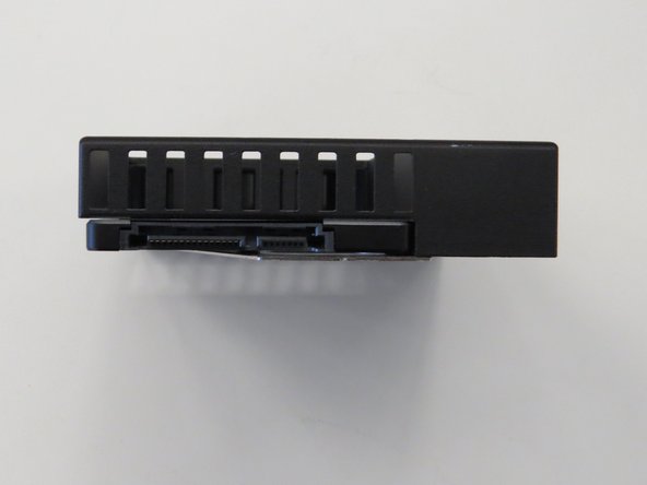 Once installed, the SSD connector should be facing outward as shown.