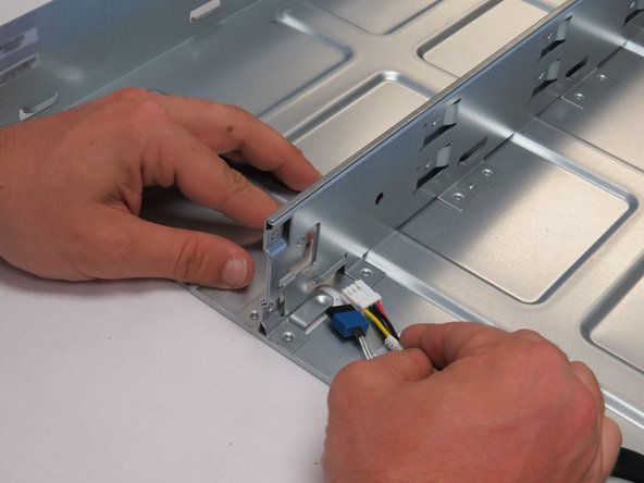 Push the left-most node SATA / power connector towards the right of the chassis, as shown.