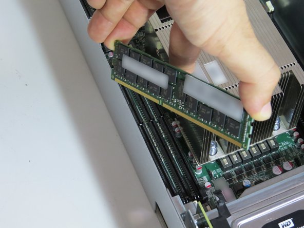 Lift the DIMM from its socket.