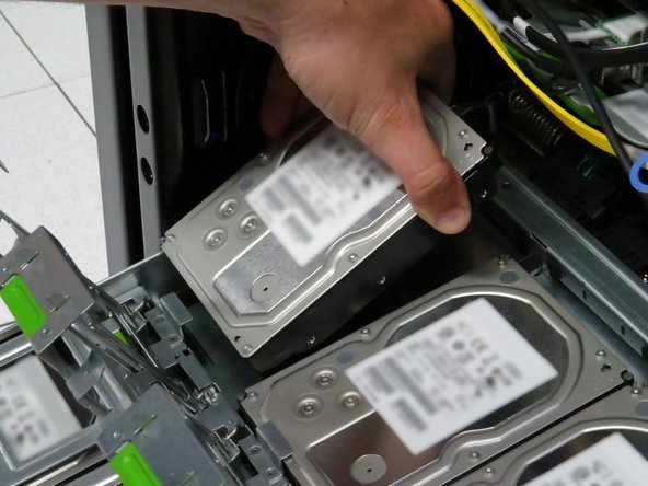 Remove each hard disk drive.