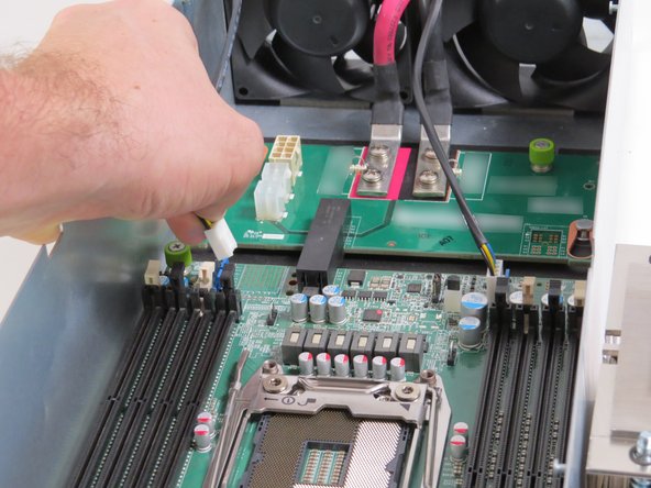 Disconnect (2) fan power cables.