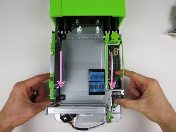Pull the two PCI Riser Cage locking handles towards the front of the server, as shown.
