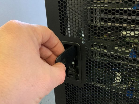 Turn the locking lever clock-wise and pull back to open the door