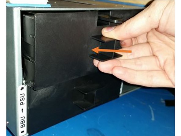 Install the PSU blanking panel by pushing the unit straight into the power shelf openening.