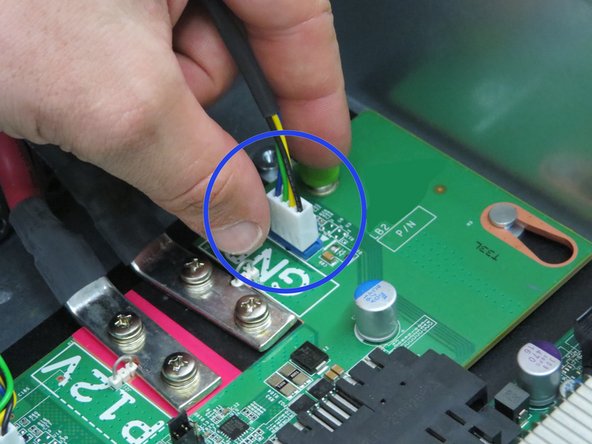 Grab the right fan power connector..