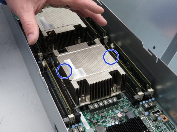 Grab the heatsink as shown.