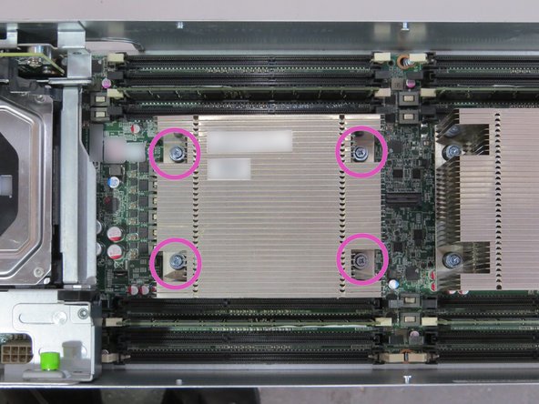 Loosen (4) torque screws with a Phillips #2 screwdriver.