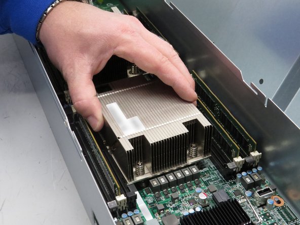 Lower heatsink onto the CPU.