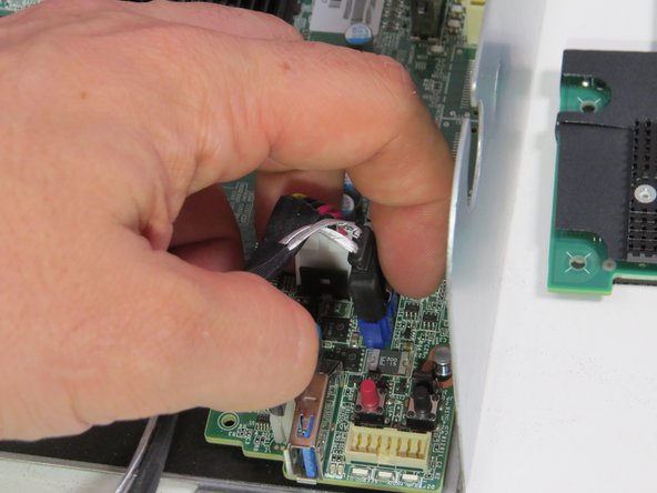 Disconnect the SATA cable from the motherboard.